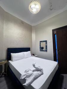 Letto o letti in una camera di Abdeen Cairo Hostel
