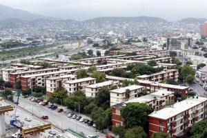 an aerial view of a city with buildings and cars at Depa Centrico en Monterrey in Monterrey