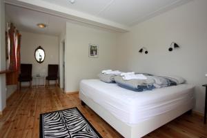 Letto o letti in una camera di Guesthouse Storu-Laugar