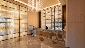 Foto dalla galleria di Guangzhou Baiyun Airport Orange Crystal Hotel a Huadu