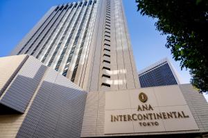 a tall building with a sign in front of it at ANA InterContinental Tokyo by IHG in Tokyo