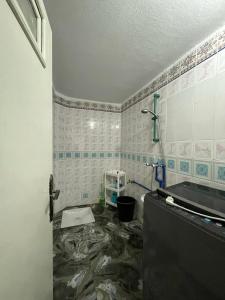 a bathroom with a sink and a shower at relax au cœur de la ville in Taroudant