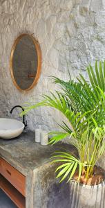 a bathroom with a sink and a mirror on a counter at Luxury 2 Bedroom Tropical Villa in Jimbaran +25 photos