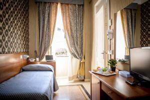 Postel nebo postele na pokoji v ubytování Hotel Emmaus