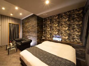 Hotel Rakuseki Honkan客房内的一张或多张床位