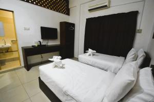 TV a/nebo společenská místnost v ubytování AZYA Hotel + 35 fotografií