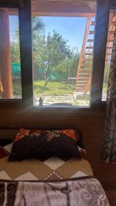 Ένα ή περισσότερα κρεβάτια σε δωμάτιο στο Sunface Homestay