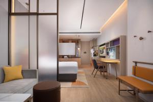 Posezení v ubytování Home2 Suite by Hilton Ningbo Yinzhou