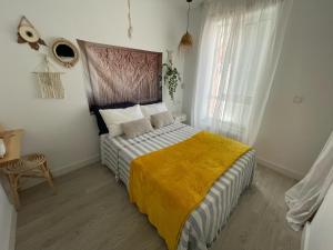 Postel nebo postele na pokoji v ubytování Dharmia