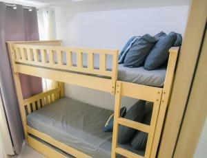 Ένα ή περισσότερα κρεβάτια σε δωμάτιο στο Cozy Place for 8 persons at Grass Residences +66 φωτογραφίες