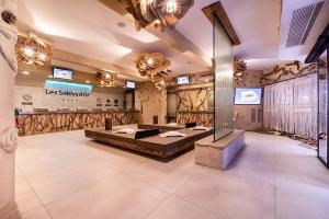a large room with a bed in the middle of it at Mobilhome de Gigi in Le Grau-dʼAgde