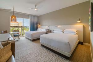 Postel nebo postele na pokoji v ubytování Hyatt Regency Aruba Resort & Casino