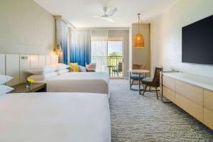 Postel nebo postele na pokoji v ubytování Hyatt Regency Aruba Resort & Casino