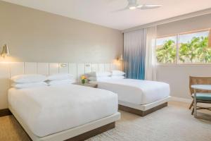 Postel nebo postele na pokoji v ubytování Hyatt Regency Aruba Resort & Casino