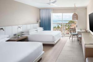 Postel nebo postele na pokoji v ubytování Hyatt Regency Aruba Resort & Casino