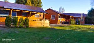 Zdjęcie z galerii obiektu Domki Letniskowe Solaris w mieście Białogóra