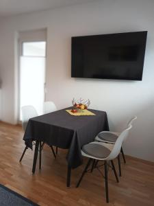 TV a/nebo společenská místnost v ubytování Appartement Kärntner Seenland