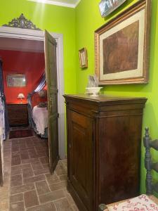 Postel nebo postele na pokoji v ubytování La Fontanella - Piccolo Appartamento nel Centro Storico di Nemi