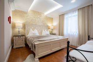 Postel nebo postele na pokoji v ubytování Zámoček Mraznica