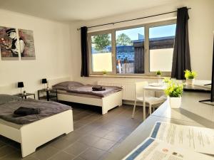 Postel nebo postele na pokoji v ubytování Work & Relax Apartment in Industrial area