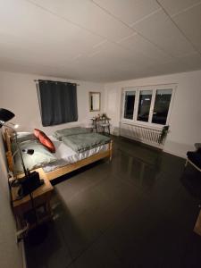 Rúm í herbergi á Eco Home