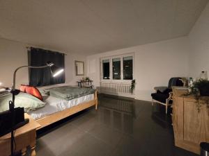Rúm í herbergi á Eco Home