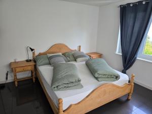 Rúm í herbergi á Eco Home