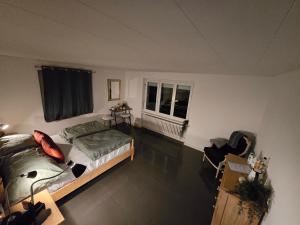 Rúm í herbergi á Eco Home