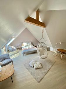 Ruang duduk di La Belle Relax - calme et tranquillité assurés - 2 personnes