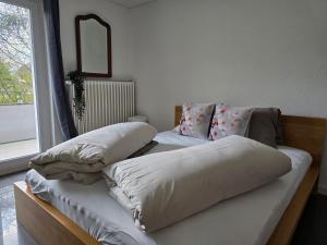 Rúm í herbergi á Eco Home