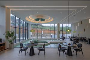 Restaurace v ubytování Xinchi Sakura Valley Resort