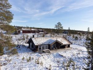 an aerial view of a house in the snow at Large and cozy family cabin with sauna in Trysil