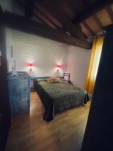 Postel nebo postele na pokoji v ubytování Hôtel MAS DE LAYALLE