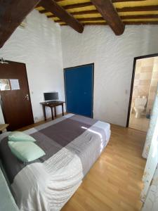 Postel nebo postele na pokoji v ubytování Hôtel MAS DE LAYALLE