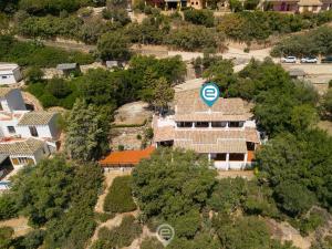an overhead view of a house with a sign on it at Estay - Seaside Gem Villa in Torre delle Stelle
