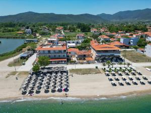 an aerial view of a resort on the beach at Mitro Apartments Sun & Sea, Vrasna beach in Nea Vrasna