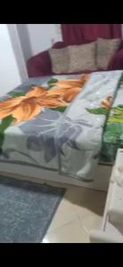 a bed sitting on top of a table at شقة مفروشة فري in Cairo