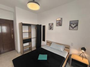 Postel nebo postele na pokoji v ubytování HABITACIONES EN APARTAMENTO COMPARTIDO w HOST