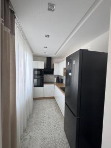 Kuchyň nebo kuchyňský kout v ubytování Apartmán Rysy