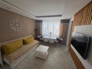 TV a/nebo společenská místnost v ubytování Apartmán Rysy