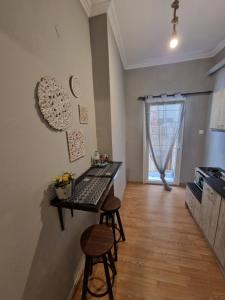 A kitchen or kitchenette at Closer "Egnatia Apartment 4" Még 22 kép