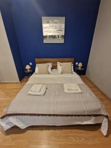 A bed or beds in a room at Closer "Egnatia Apartment 4"