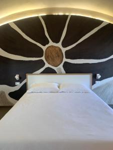Letto o letti in una camera di Nausicaa Guesthouse
