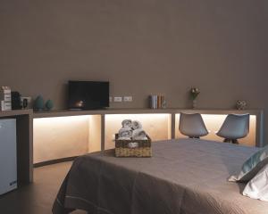 TV o dispositivi per l'intrattenimento presso Nausicaa Guesthouse