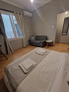 A bed or beds in a room at Closer "Egnatia Apartment 4"