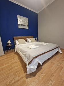 A bed or beds in a room at Closer "Egnatia Apartment 4"