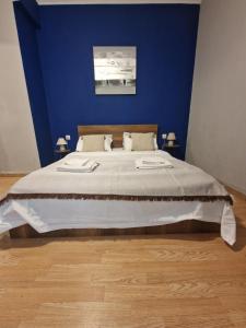 A bed or beds in a room at Closer "Egnatia Apartment 4"