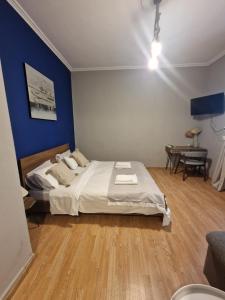 A bed or beds in a room at Closer "Egnatia Apartment 4"