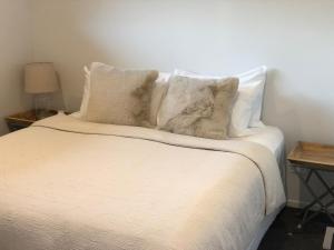 Ένα ή περισσότερα κρεβάτια σε δωμάτιο στο Prime New Apartment - Kaikōura