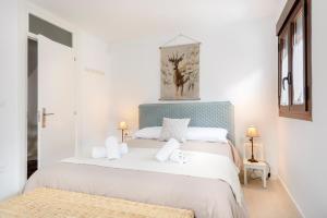 Кровать или кровати в номере Casa Santiago
